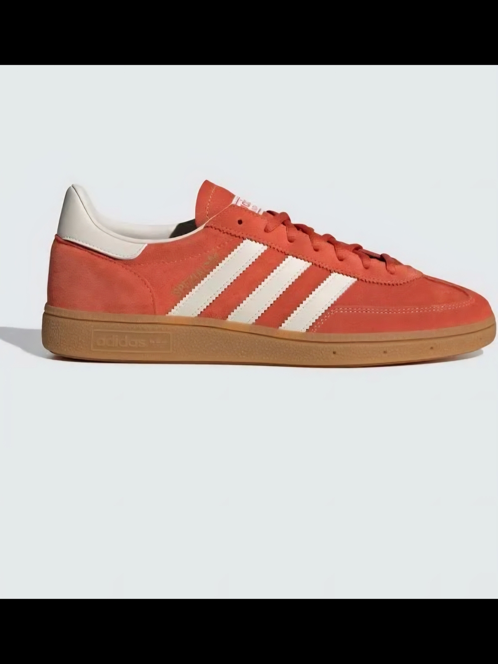 adidas Suede Low-Top Sneakers in Orange with White Stripes
